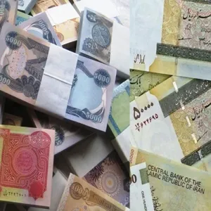خبير يعلق على استخدام العملة العراقية بالتعاملات التجارية مع إيران