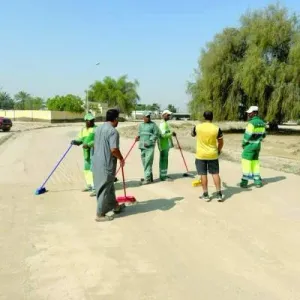 «فزعة لوى» يرسمها متطوعون بتنظيف الطرقات والأماكن العامة