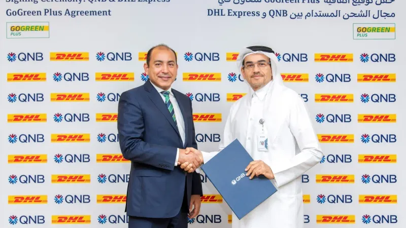 "مجموعة QNB" توقع اتفاقية مع "دي إتش إل إكسبريس" لاستخدام وقود الطيران المستدام لتعزيز حلول الشحن