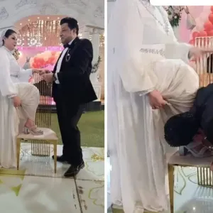 شاهد.. عريس مصري يقبل قدم عروسه في حفل الزفاف لسبب غريب